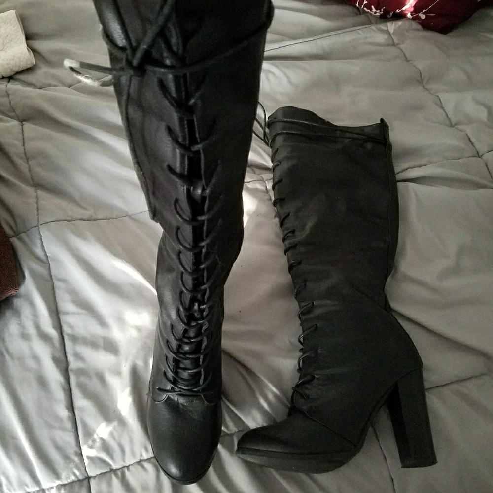 Black knee high boots.